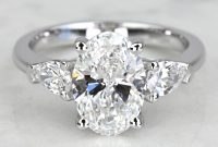 the-epitome-of-elegance-a-deep-dive-into-oval-diamond-rings-with-pear-side-stones
